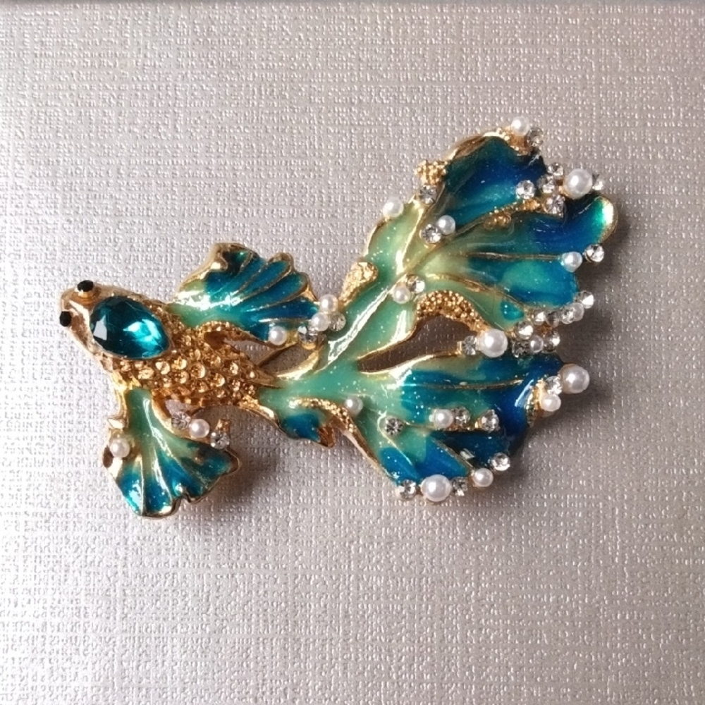 Elegant Gold and Blue Fish Brooch
